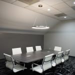Well-lit board room at Highland-March Workspaces